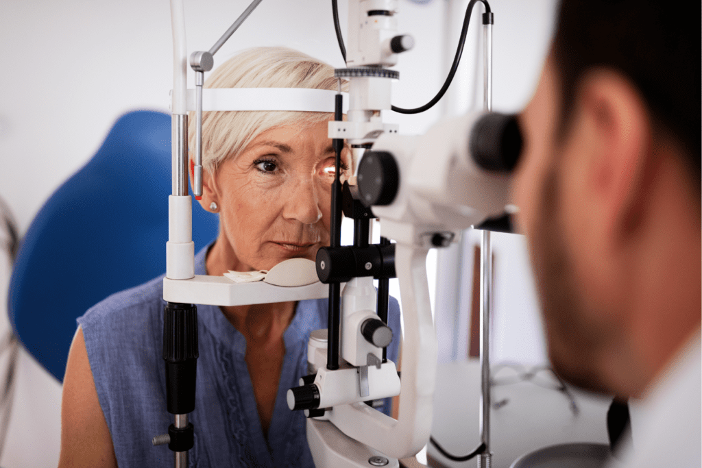 Women having eye examination to discover cause of pain behind the eye