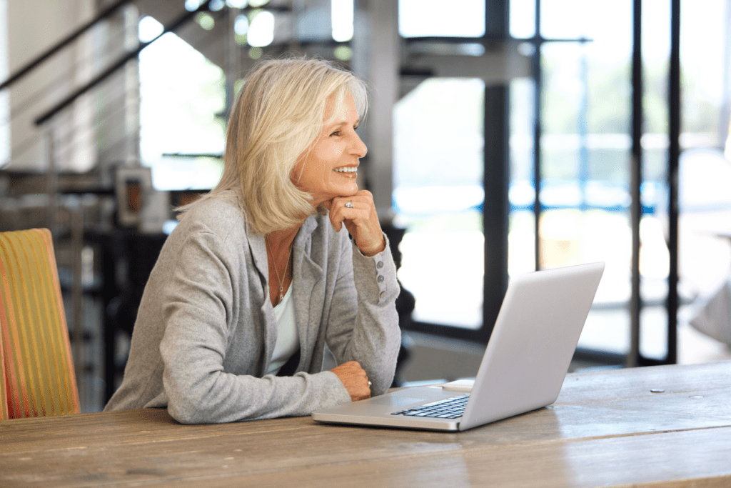 Woman sitting infront of laptop