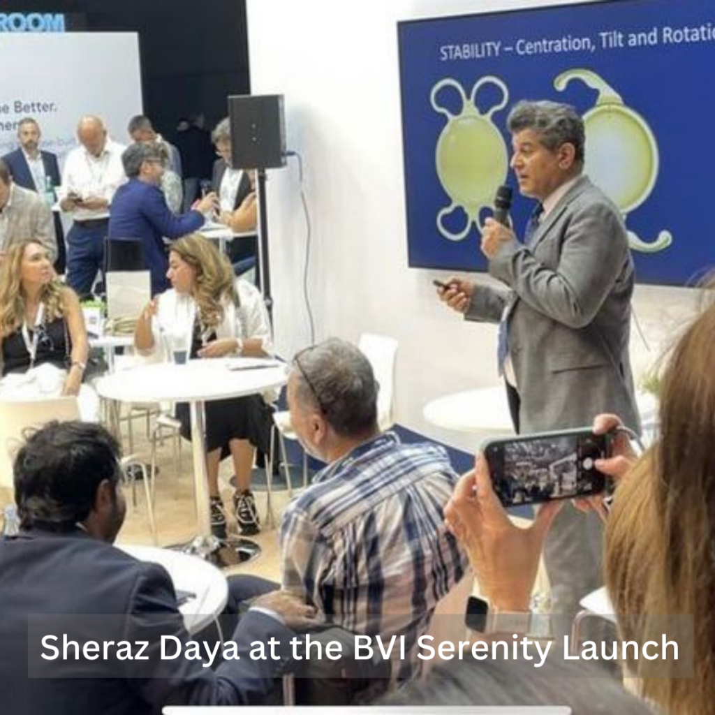 Man speaking about new BVI Serenity lenses into microphone in front of large crowd