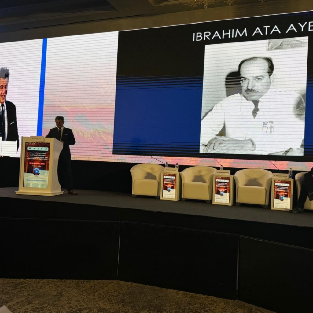 Eye surgeon on stage presenting at the Jordanian Ophthalmological Society