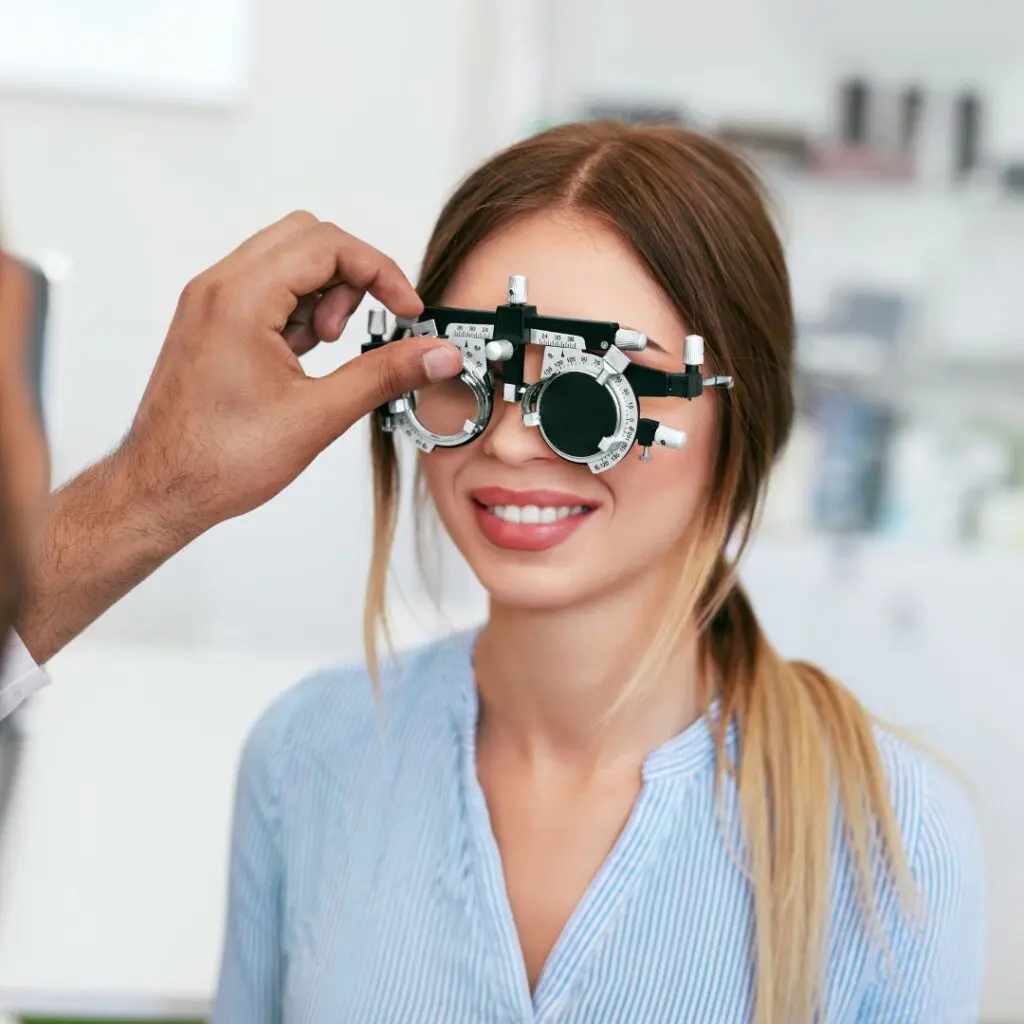 Centre for Sight young woman having eyes tested in opticians