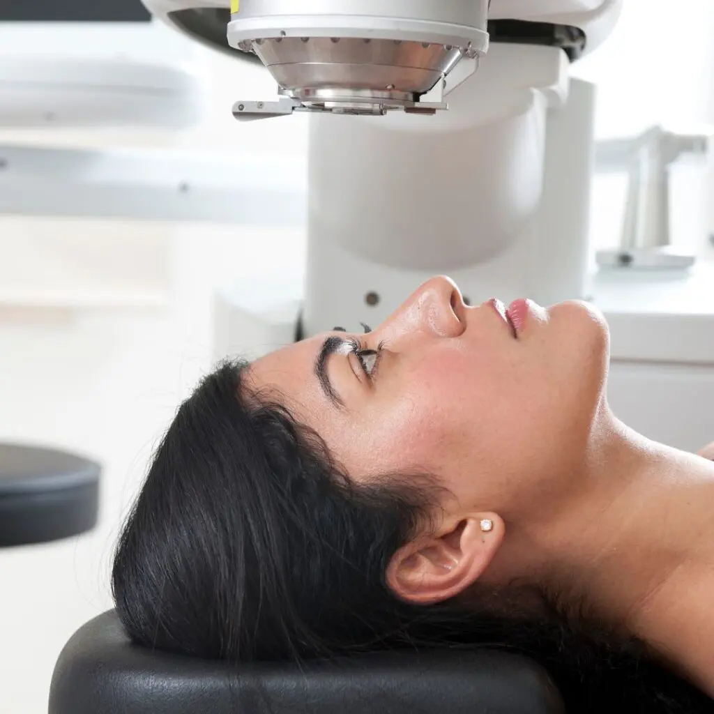 Centre for Sight female brunette undergoing laser eye surgery