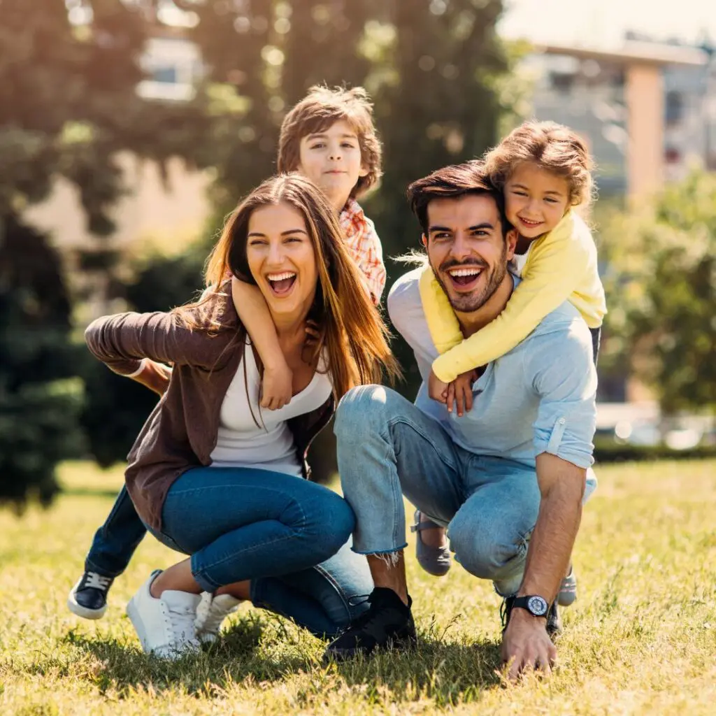 Centre for Sight family smiling in sun benefitting from laser eye surgery kingston