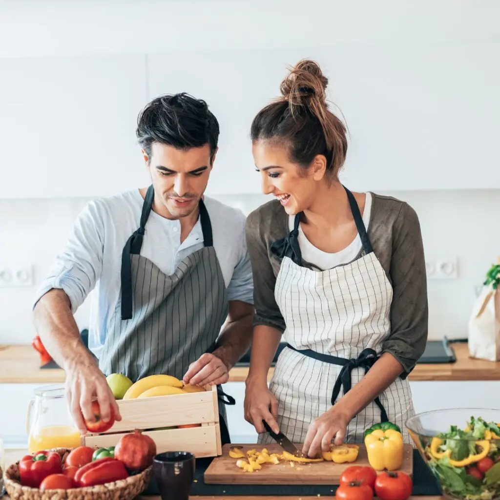 Centre for Sight couple cooking in kitchen after laser eye surgery epsom