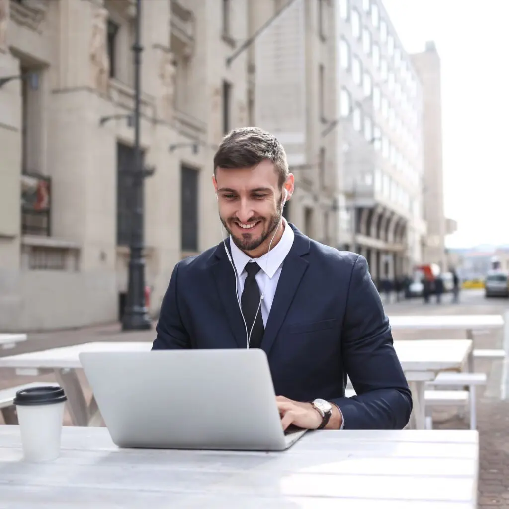 Centre for Sight man on laptop after laser eye surgery harley street