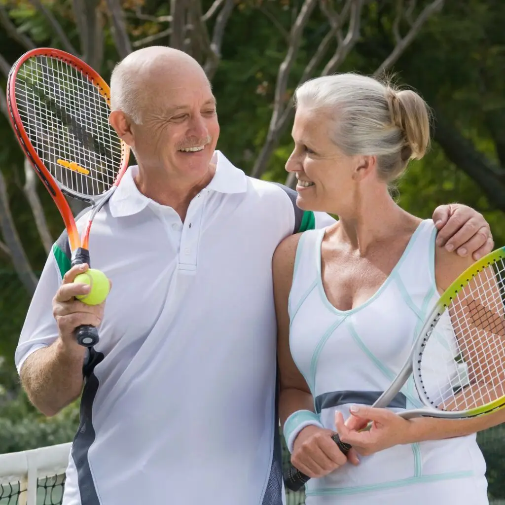 Centre for Sight couple playing tennis after vision correction surgery