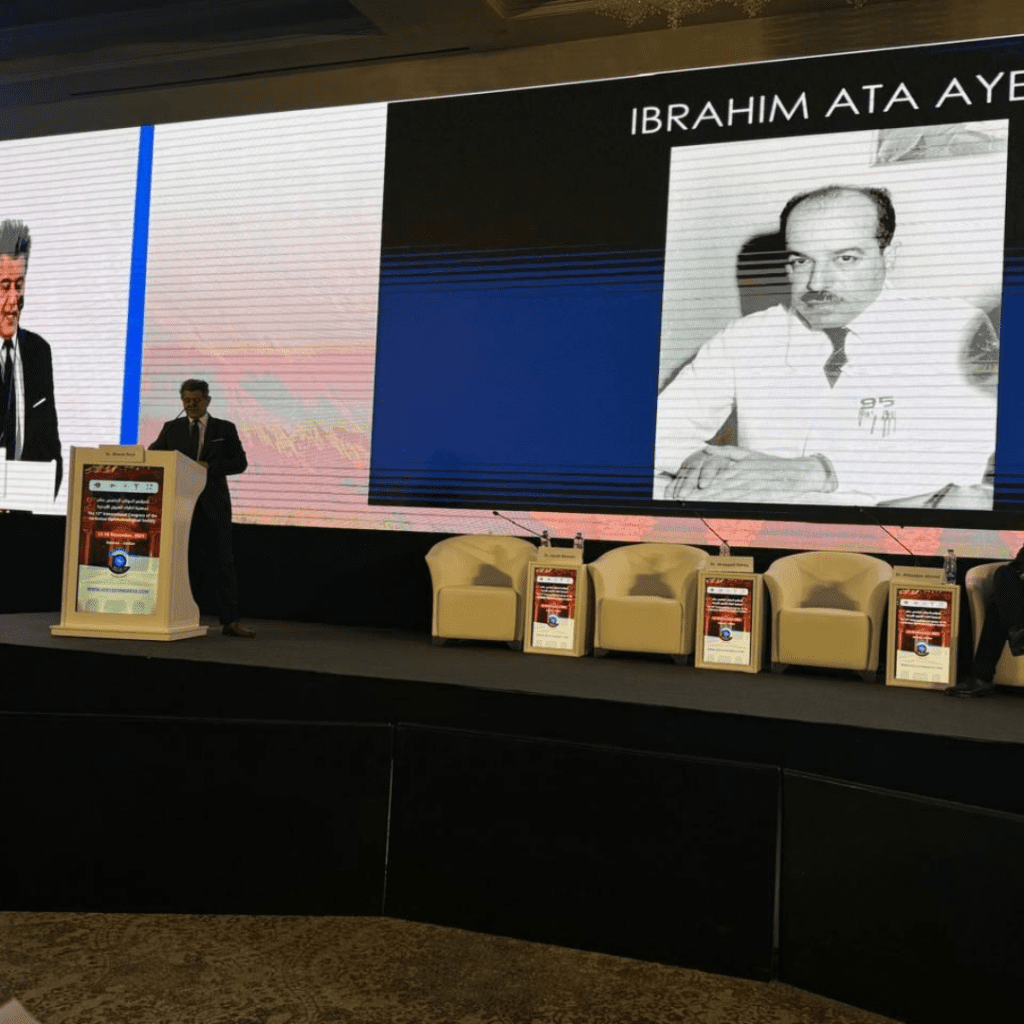 Eye surgeon on stage presenting at the Jordanian Ophthalmological Society