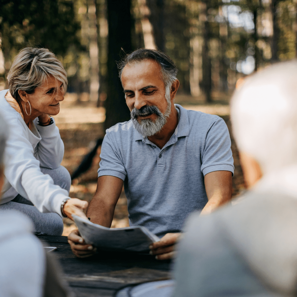 Centre for Sight patient Middle aged and lady man smiling with grey t shirt on and grey hair after LLLT dry eye treatment stock image