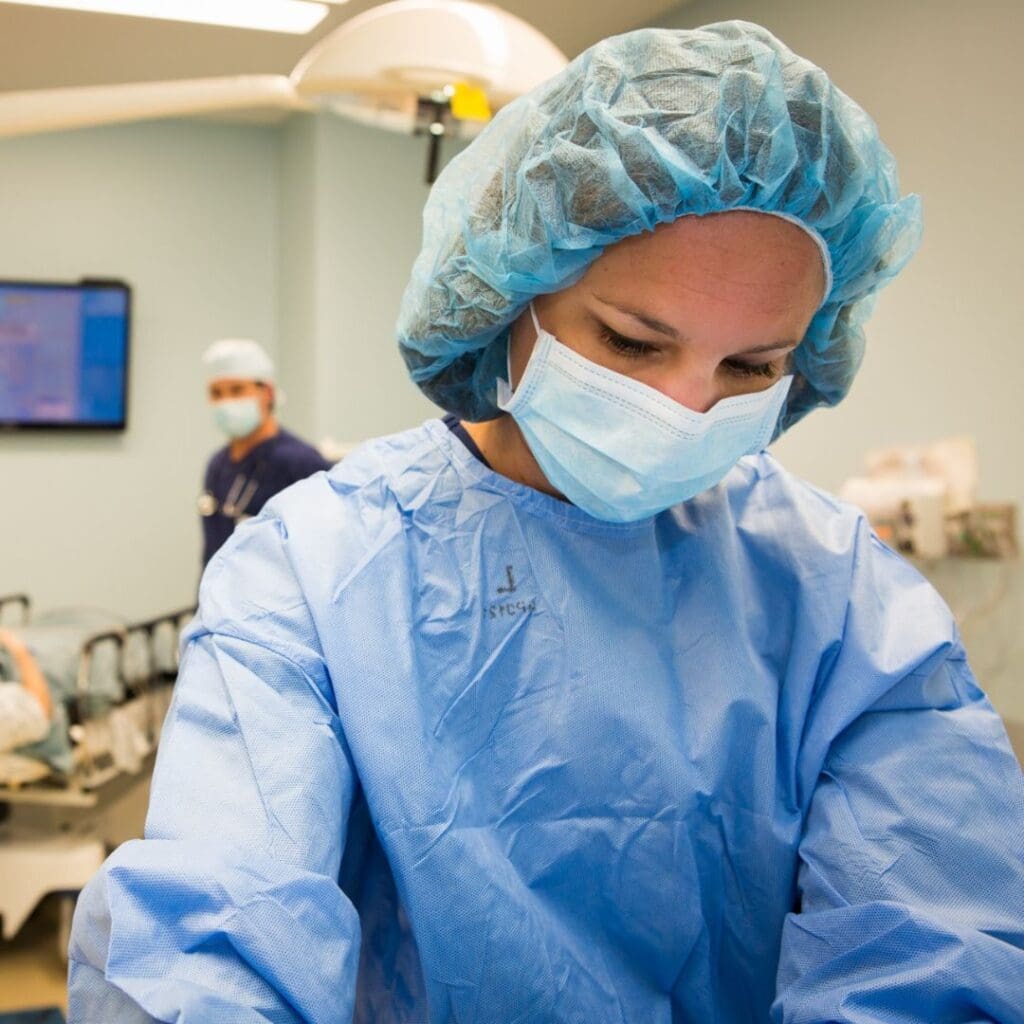 Centre for Sight surgeon in scrubs after cataract surgery stock image